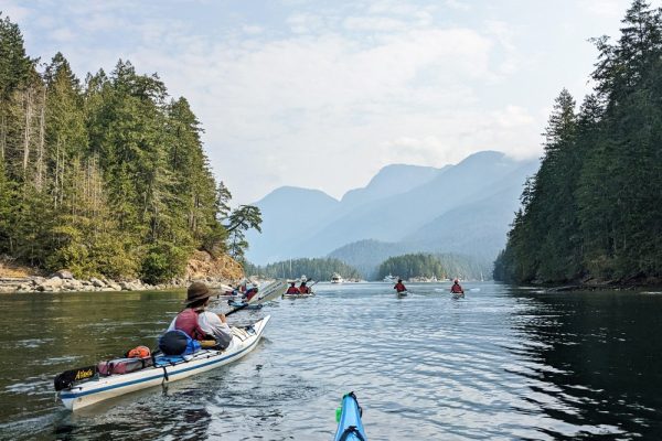 A kayakers view from their kayak in Desolation Sound