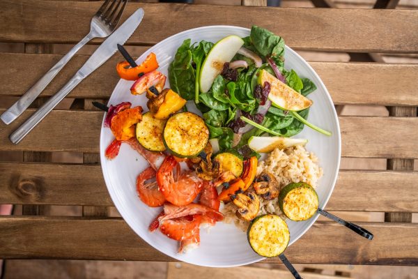 A prepared prawn dinner with vegetables